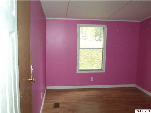 2965 Cedar Lane Road Kents Store, VA 23084 - Photo 15 of 20 a view of an empty room with a window