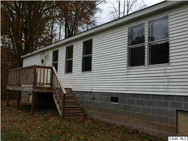 2965 Cedar Lane Road Kents Store, VA 23084 - Photo 5 of 20 a view of a house with a yard