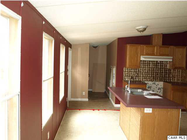 2965 Cedar Lane Road Kents Store, VA 23084 - Photo 9 of 20 a bathroom with a sink and a mirror