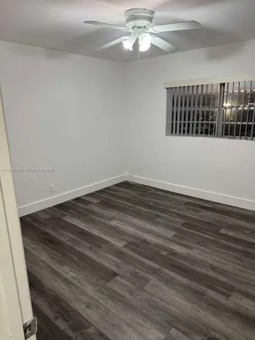 a view of a livingroom with a fan