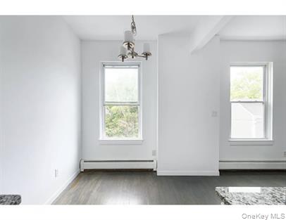 144 Union Street, Unit 6 Poughkeepsie, NY 12601 - Photo 8 of 9 a view of an empty room with a window