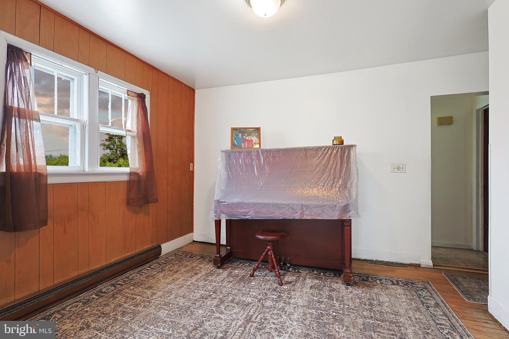 159 Rocket Center Road Keyser, WV 26726 - Photo 13 of 64 a room with a table and a window