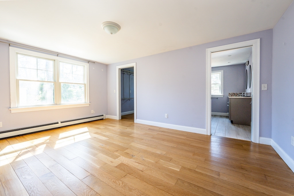 67 Crawford Road Barnstable, MA 02635 - Photo 11 of 26 a view of an empty room with wooden floor and a window