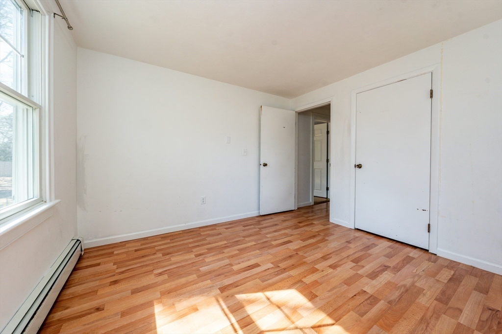 67 Crawford Road Barnstable, MA 02635 - Photo 14 of 26 a view of empty room with wooden floor and fan