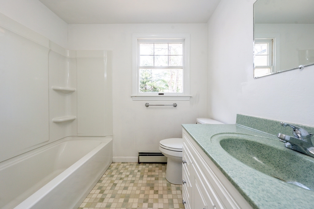 67 Crawford Road Barnstable, MA 02635 - Photo 16 of 26 a bathroom with a sink a toilet and bathtub