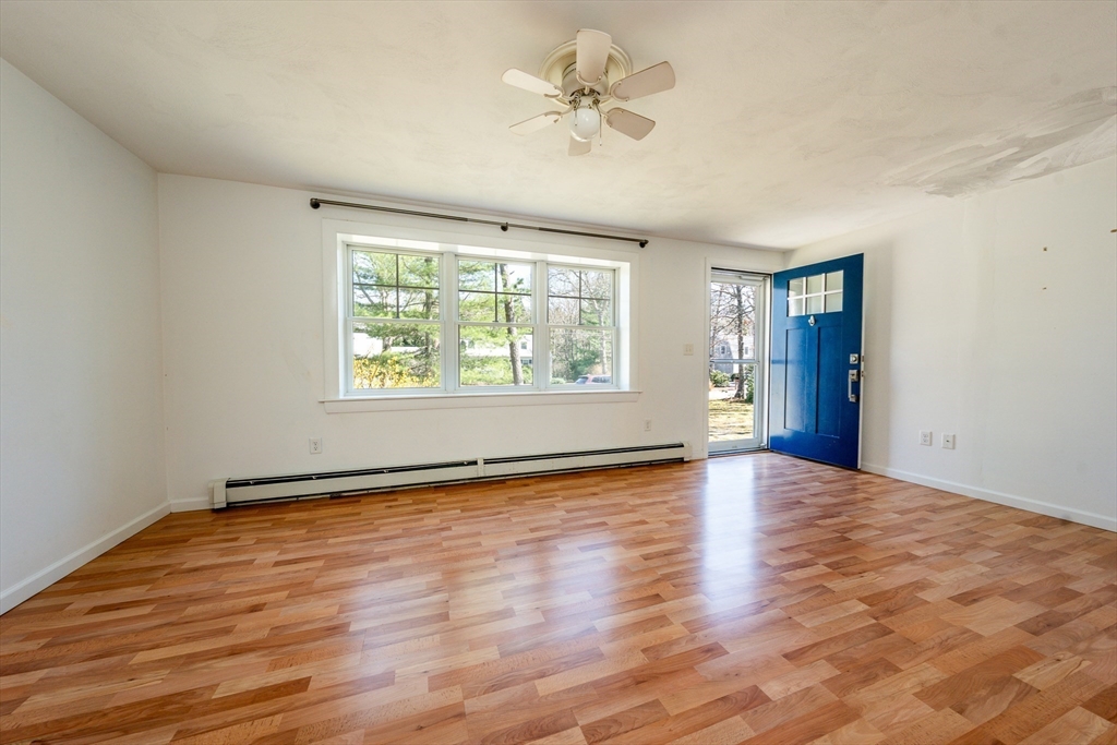 67 Crawford Road Barnstable, MA 02635 - Photo 2 of 26 wooden floor in an empty room with a window