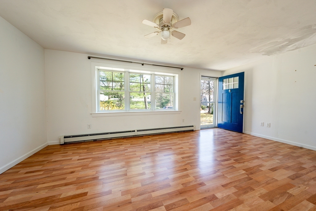 67 Crawford Road Barnstable, MA 02635 - Photo 4 of 26 wooden floor in an empty room with a window