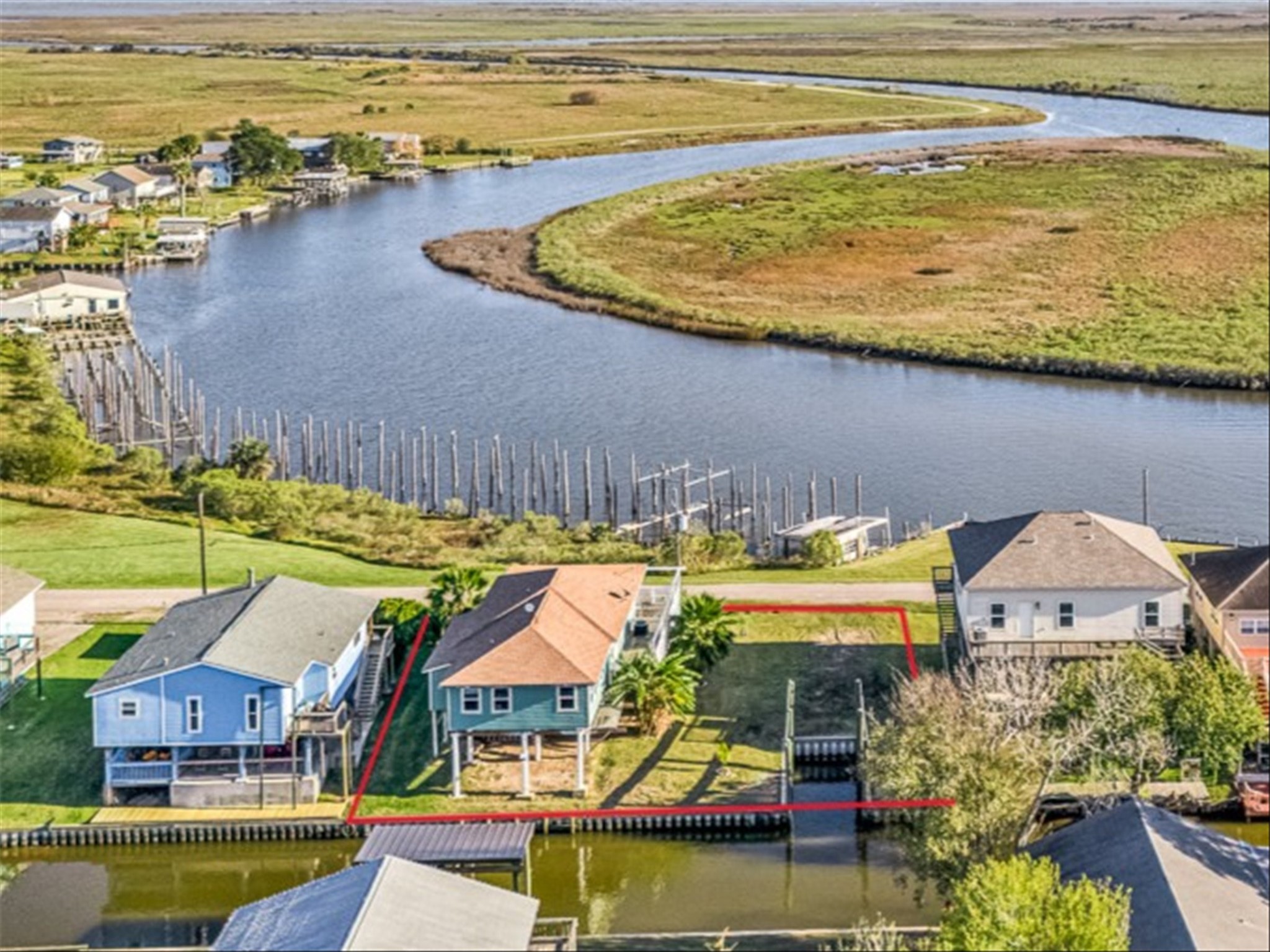 a aerial view of a house with a swimming pool and outdoor space