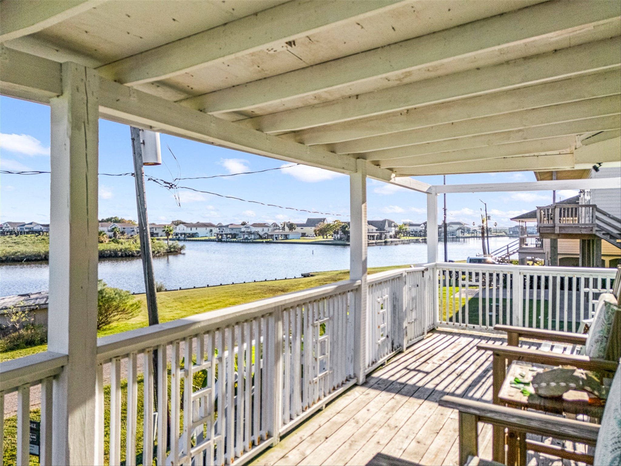 159 Garth Street Freeport, TX 77541 - Photo 15 of 42 a view of a balcony with wooden floor