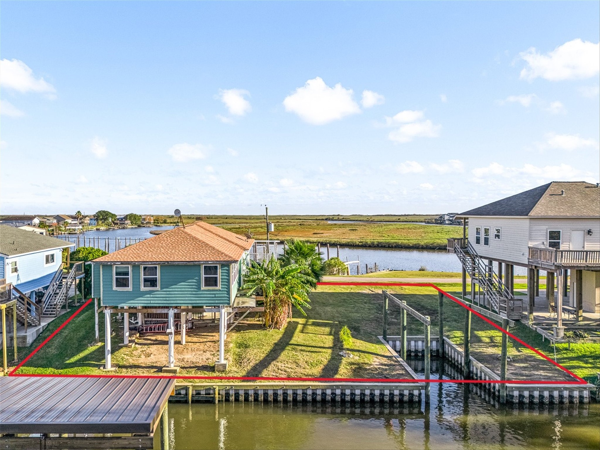 159 Garth Street Freeport, TX 77541 - Photo 2 of 42 a view of houses with outdoor space and lakeside