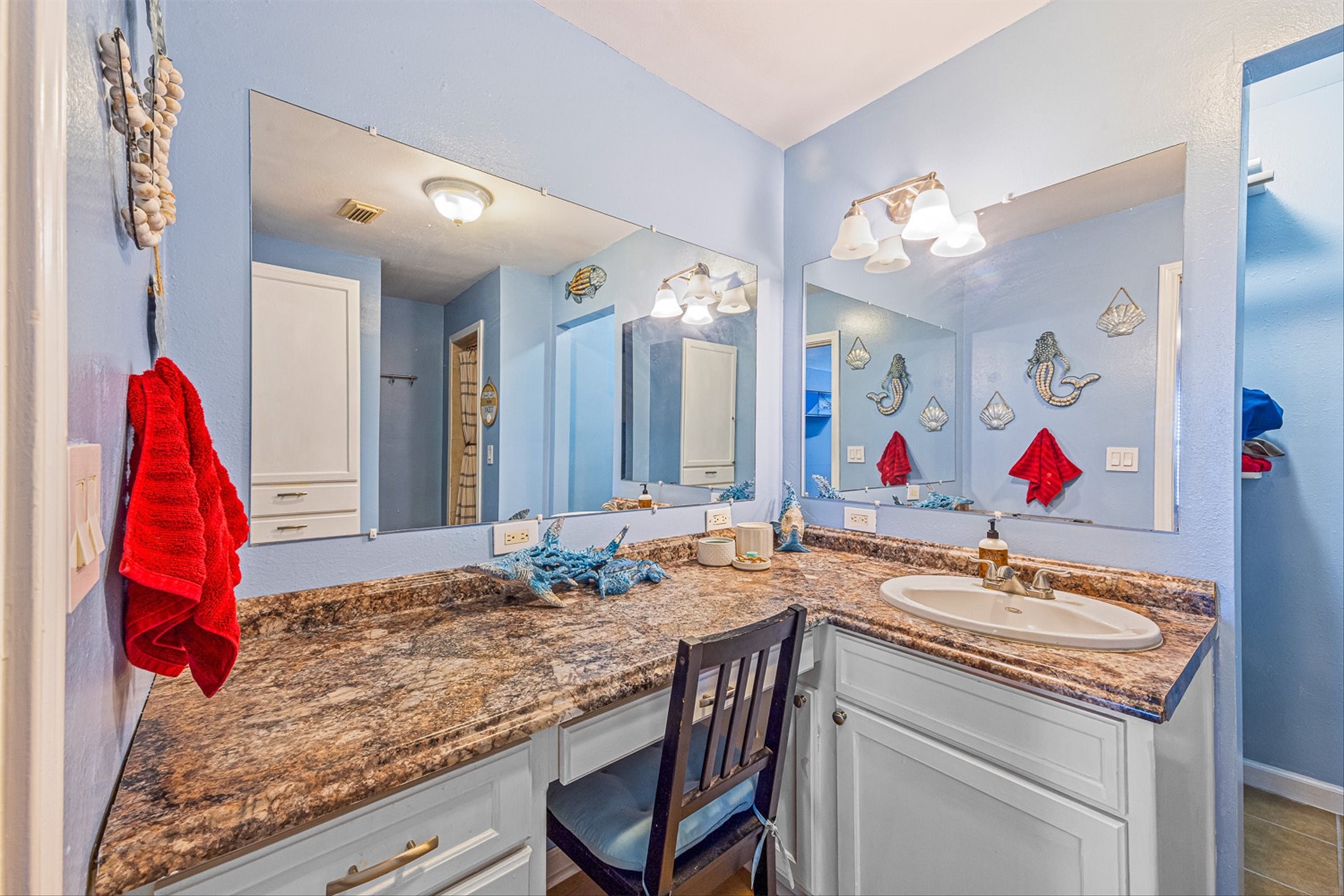 159 Garth Street Freeport, TX 77541 - Photo 34 of 42 a bathroom with a granite countertop sink and a mirror