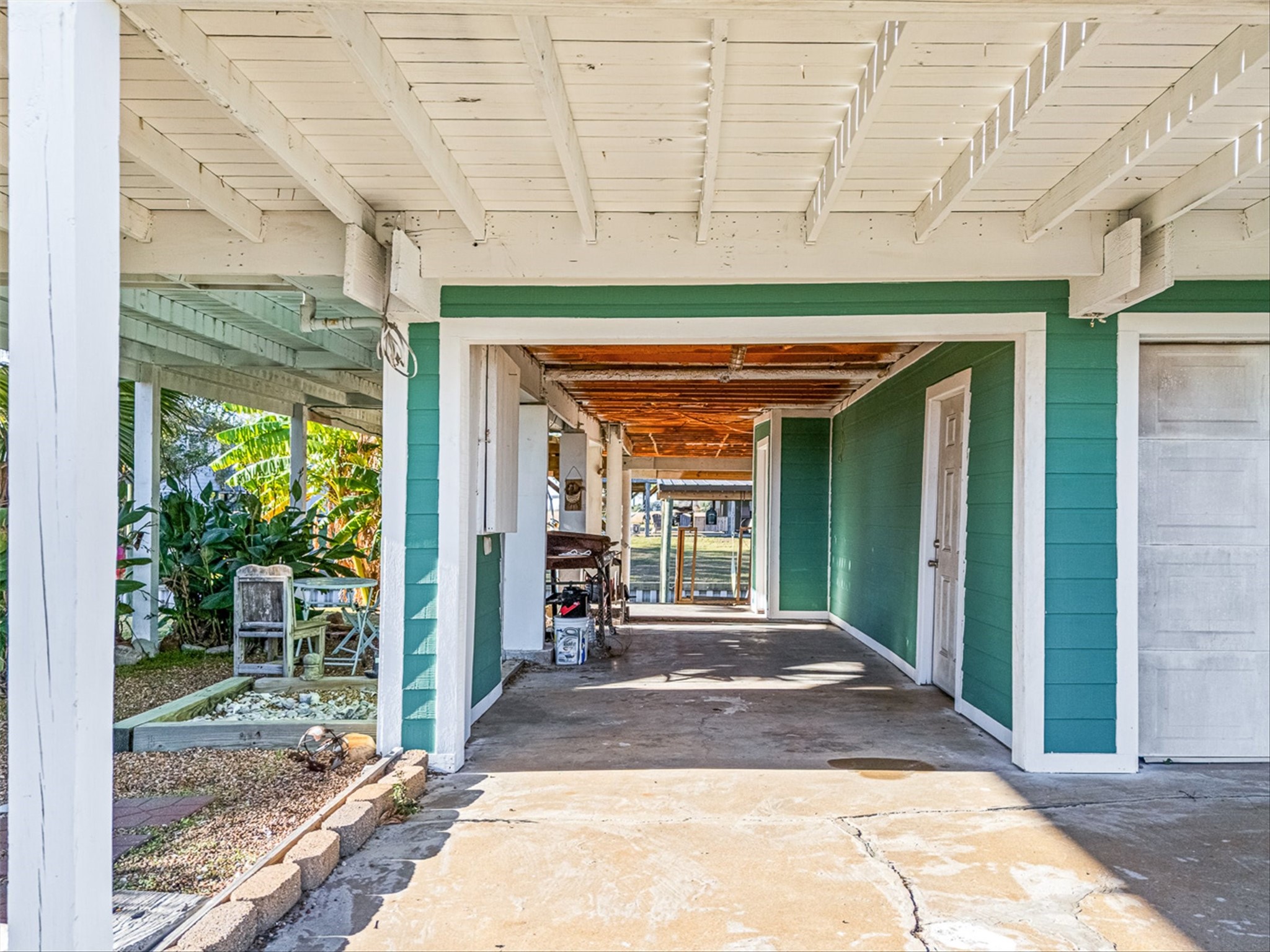 159 Garth Street Freeport, TX 77541 - Photo 9 of 42 a front view of a house with a porch
