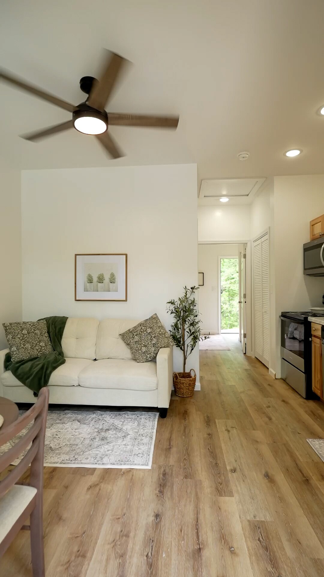 8057 Maple Street Lyles, TN 37098 - Photo 3 of 10 a living room with furniture and a flat screen tv