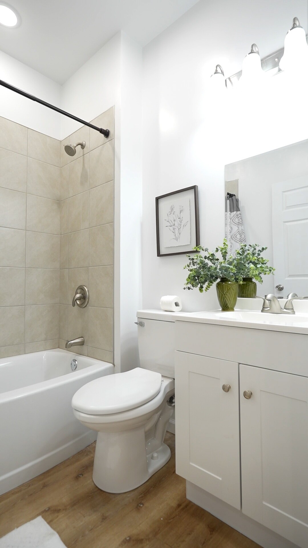 8057 Maple Street Lyles, TN 37098 - Photo 6 of 10 a bathroom with a sink toilet and shower