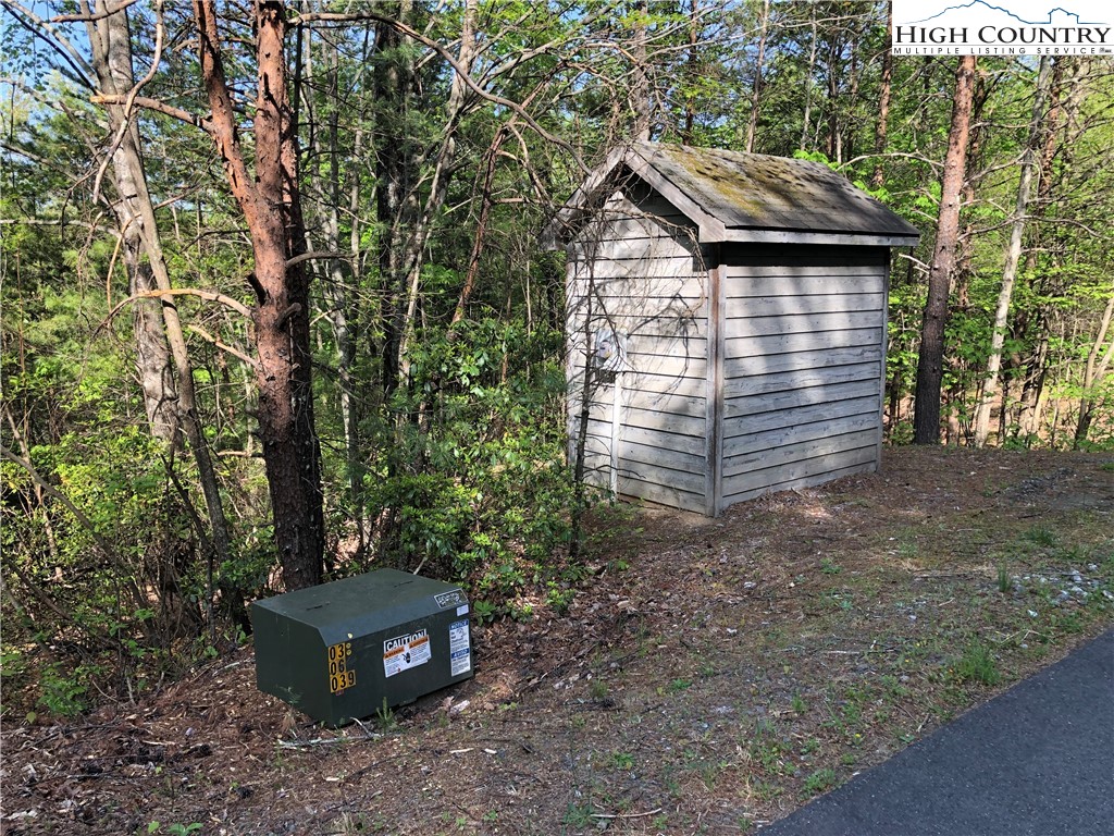 Lot 24 Staghorn Road Purlear, NC 28665 - Photo 6 of 27 a pathway of a house with a yard