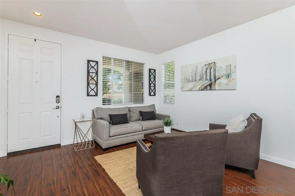 1022 Greenway Road Oceanside, CA 92057 - Photo 3 of 25 a living room with furniture and wooden floor