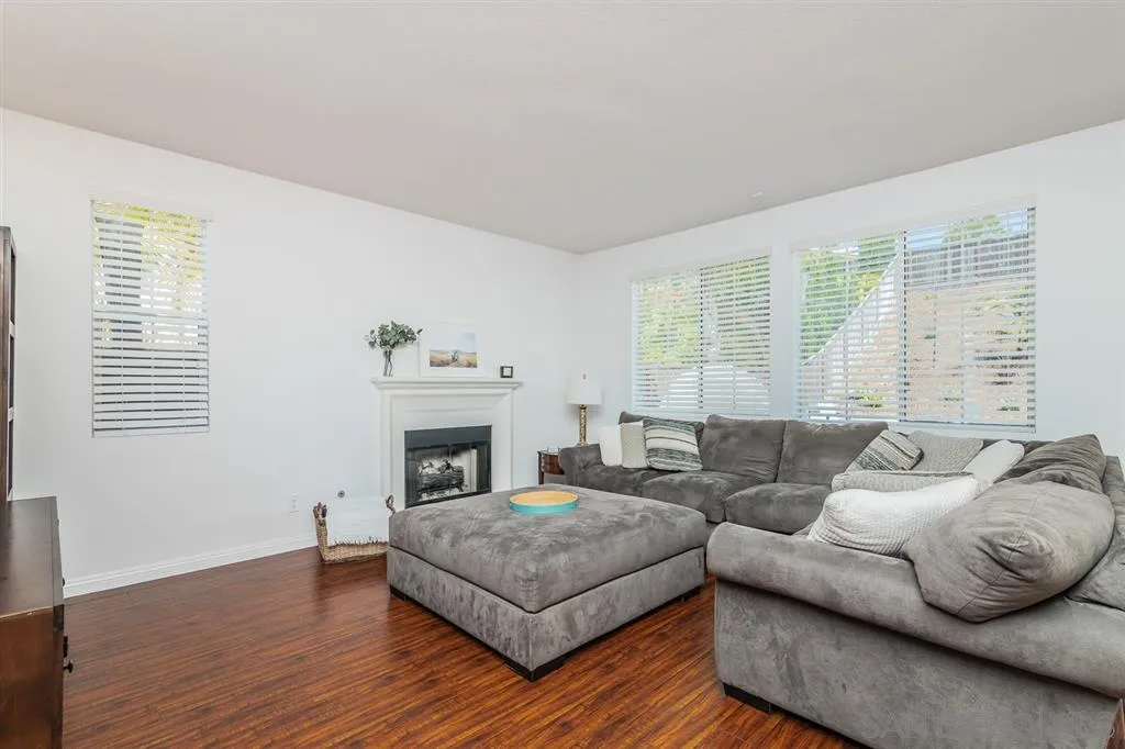 1022 Greenway Road Oceanside, CA 92057 - Photo 7 of 25 a living room with furniture and a fireplace