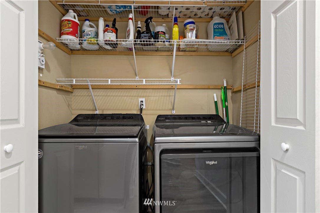 19102 20th Drive Southeast, Unit B204 Bothell, WA 98012 - Photo 12 of 30 a kitchen with a stove top oven