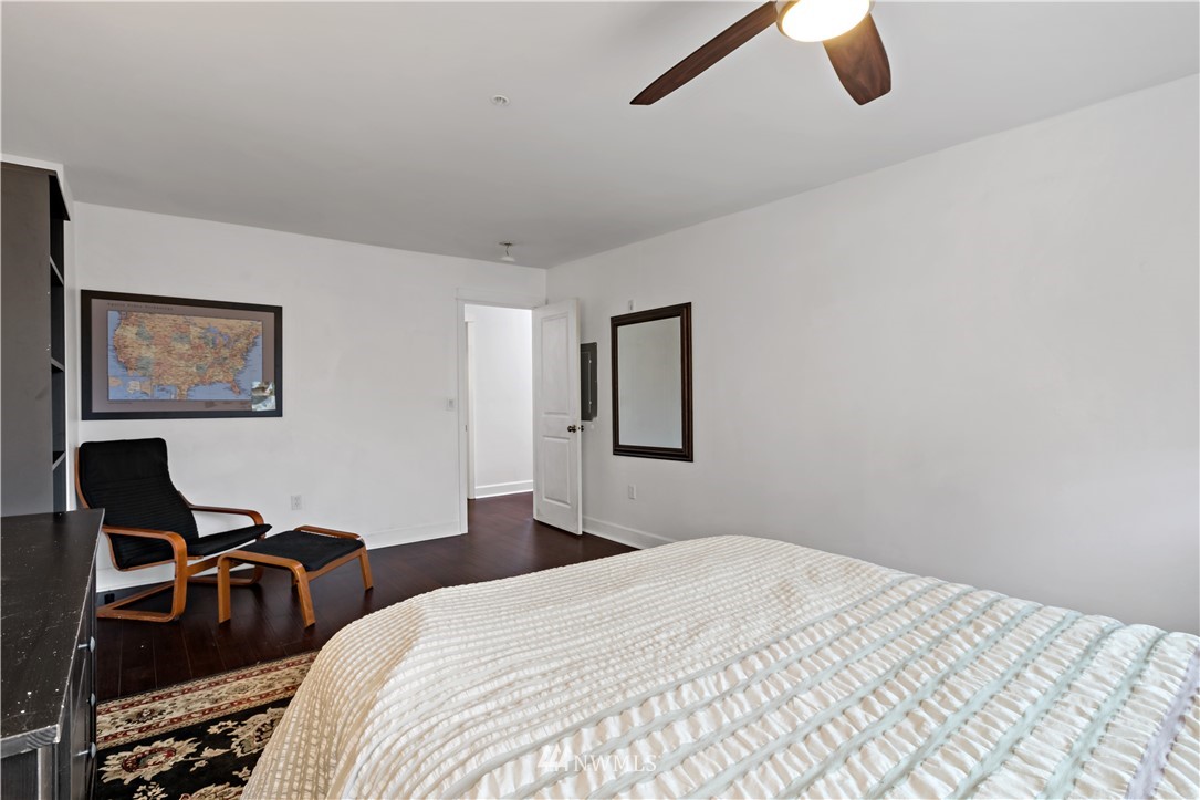 19102 20th Drive Southeast, Unit B204 Bothell, WA 98012 - Photo 14 of 30 a bedroom with bed and window
