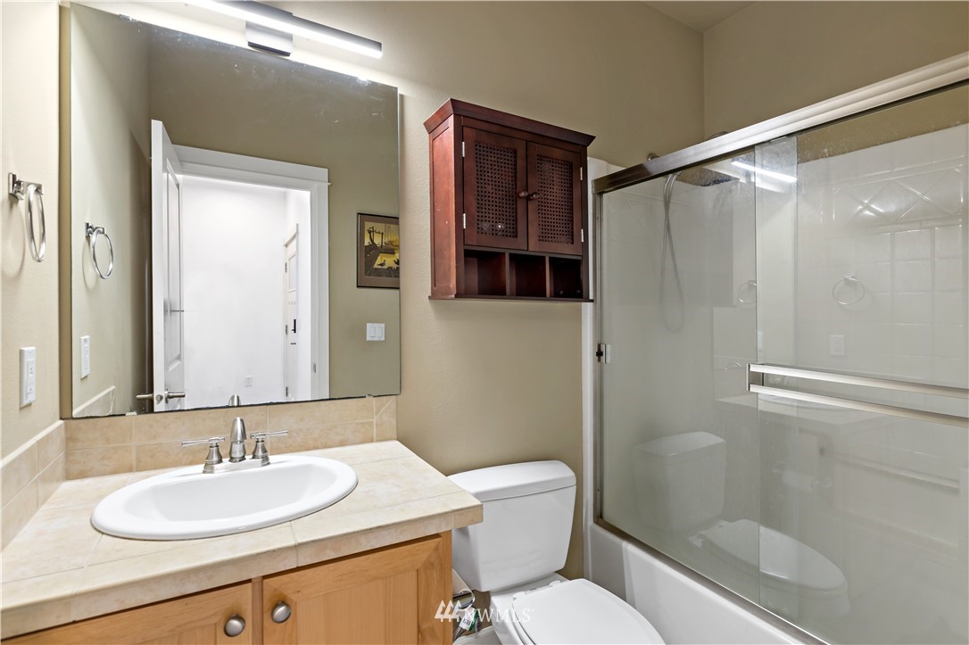 19102 20th Drive Southeast, Unit B204 Bothell, WA 98012 - Photo 15 of 30 a bathroom with a sink and a mirror