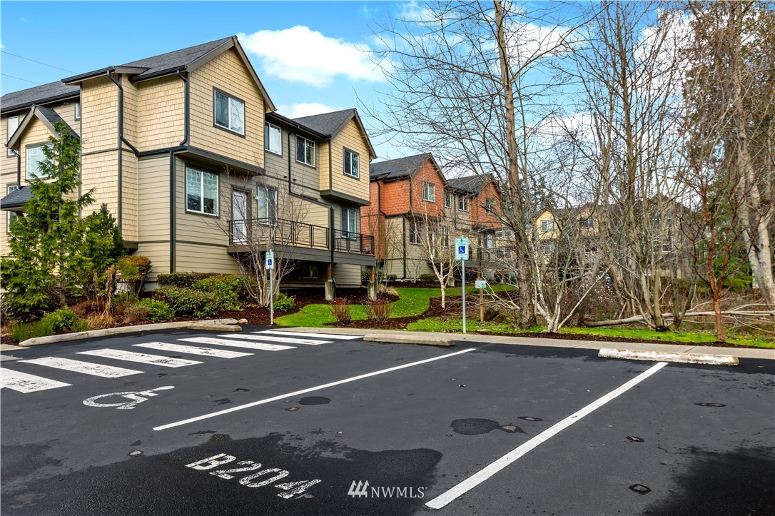 19102 20th Drive Southeast, Unit B204 Bothell, WA 98012 - Photo 24 of 30 a view of a street with houses