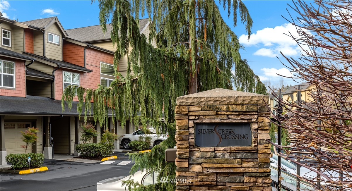 19102 20th Drive Southeast, Unit B204 Bothell, WA 98012 - Photo 26 of 30 a view of a brick building with many windows