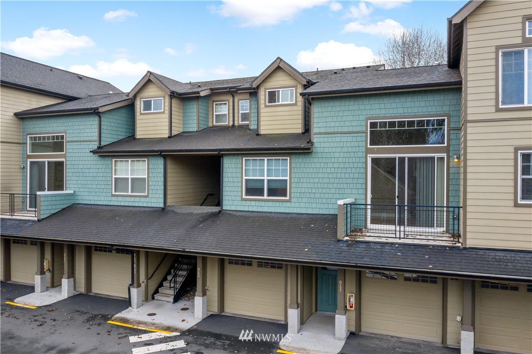 19102 20th Drive Southeast, Unit B204 Bothell, WA 98012 - Photo 27 of 30 a front view of a house with a yard