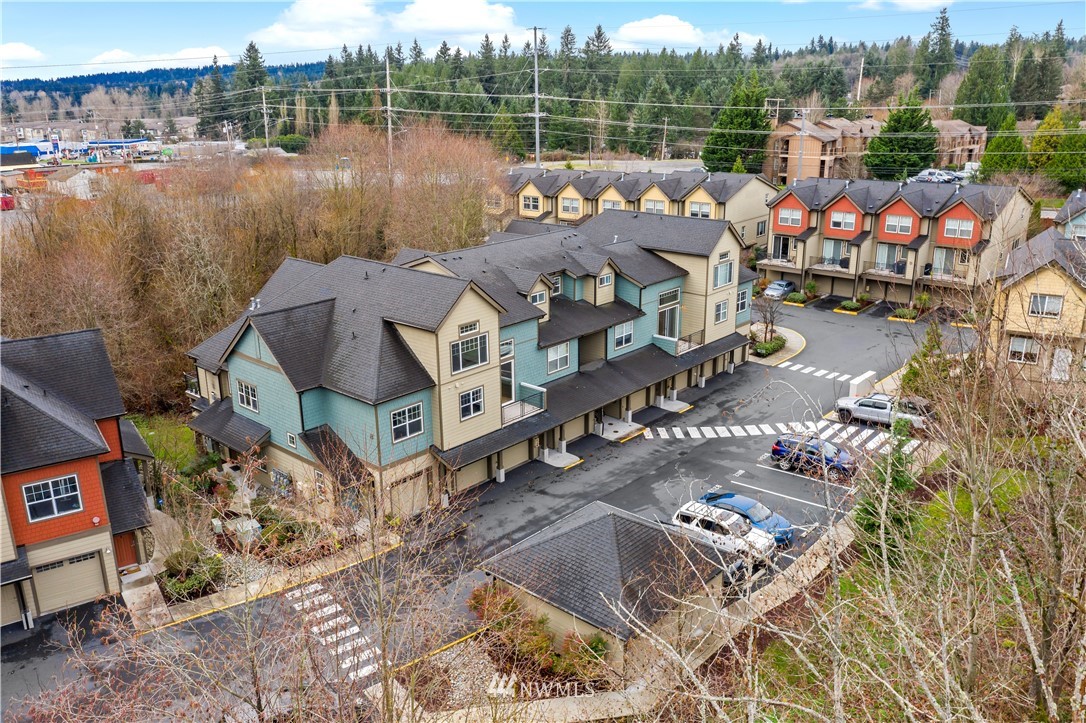 19102 20th Drive Southeast, Unit B204 Bothell, WA 98012 - Photo 29 of 30 a picture of city view with lake view and mountain view