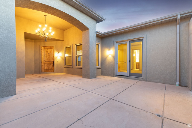 888 East Fiddlers Canyon Road Cedar City, UT 84721 - Photo 8 of 74 Back of house featuring a patio area and stucco siding