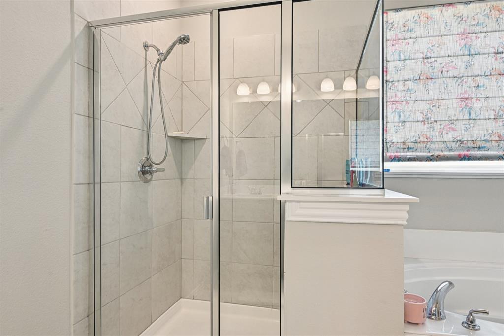 2505 Southern Oak Trail Terrell, TX 75161 - Photo 27 of 38 Walk in shower provides removable shower head and a convenient bench seat inside
