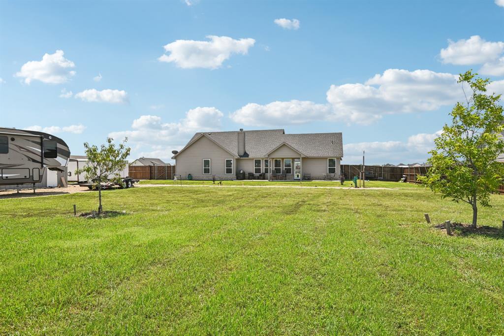 2505 Southern Oak Trail Terrell, TX 75161 - Photo 35 of 38 Backyard provides fruit bearing Pecan and Nectarine trees.