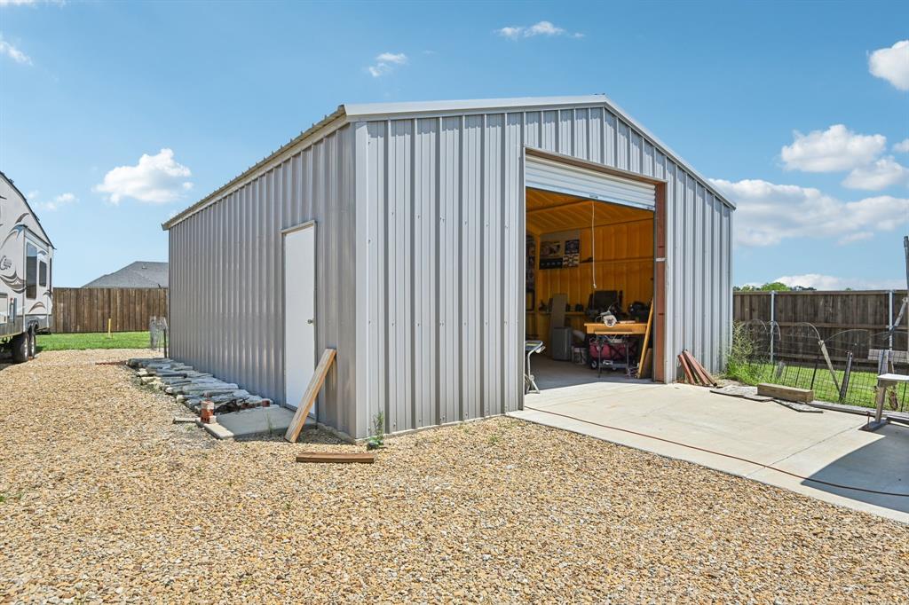 2505 Southern Oak Trail Terrell, TX 75161 - Photo 36 of 38 24X30 Shop with wired 30amp AND 50amp available. Large roll up door and side door