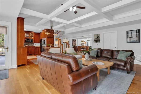 a dining room with furniture window wooden floor