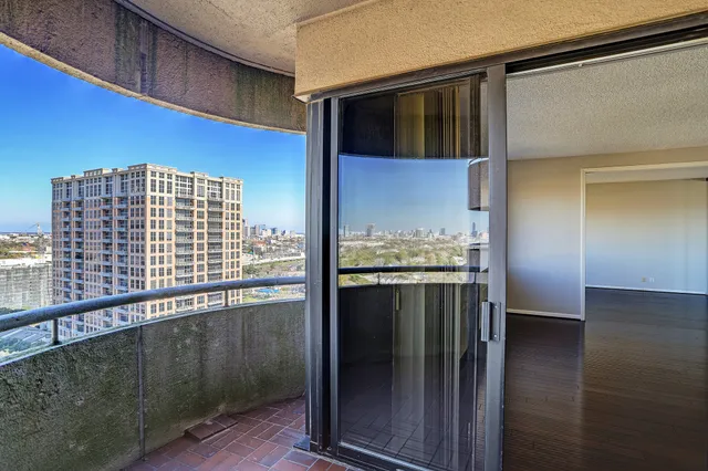 a kitchen with kitchen island a counter top space and cabinets