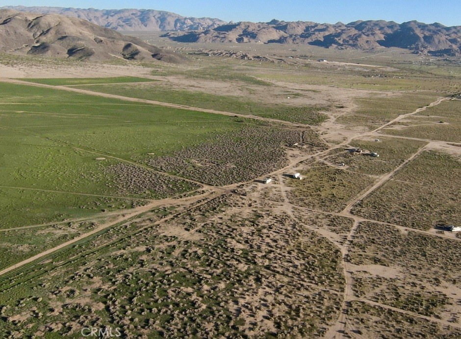 65650 Sun Mesa Road Joshua Tree, CA 92252 - Photo 3 of 11 a view of an ocean and a mountain view