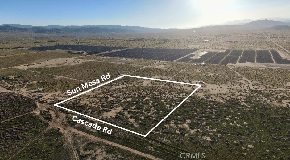 65650 Sun Mesa Road Joshua Tree, CA 92252 - Photo 6 of 11 an outdoor sitting area with an ocean view