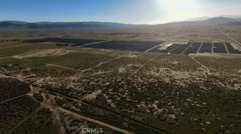 65650 Sun Mesa Road Joshua Tree, CA 92252 - Photo 7 of 11 an aerial view of house with yard