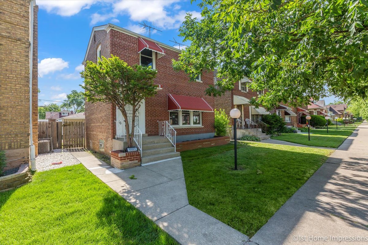 10005 South Sangamon Street Chicago, IL 60643 - Photo 1 of 30 a house with garden in front of it