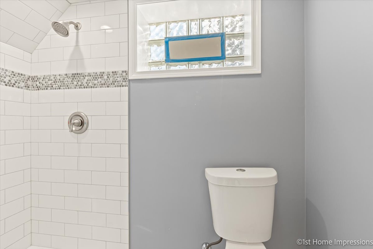 10005 South Sangamon Street Chicago, IL 60643 - Photo 23 of 30 a bathroom with a toilet and a shower