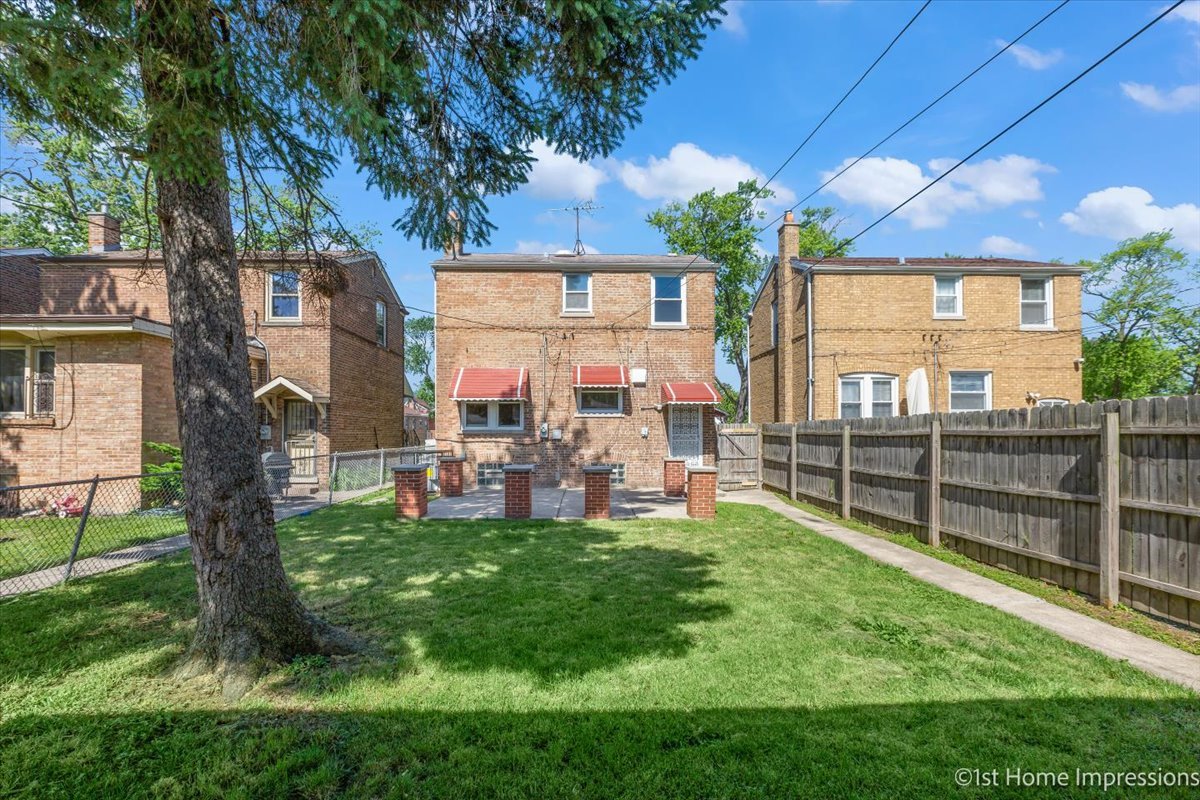 10005 South Sangamon Street Chicago, IL 60643 - Photo 29 of 30 a view of a backyard with table and chairs and potted plants