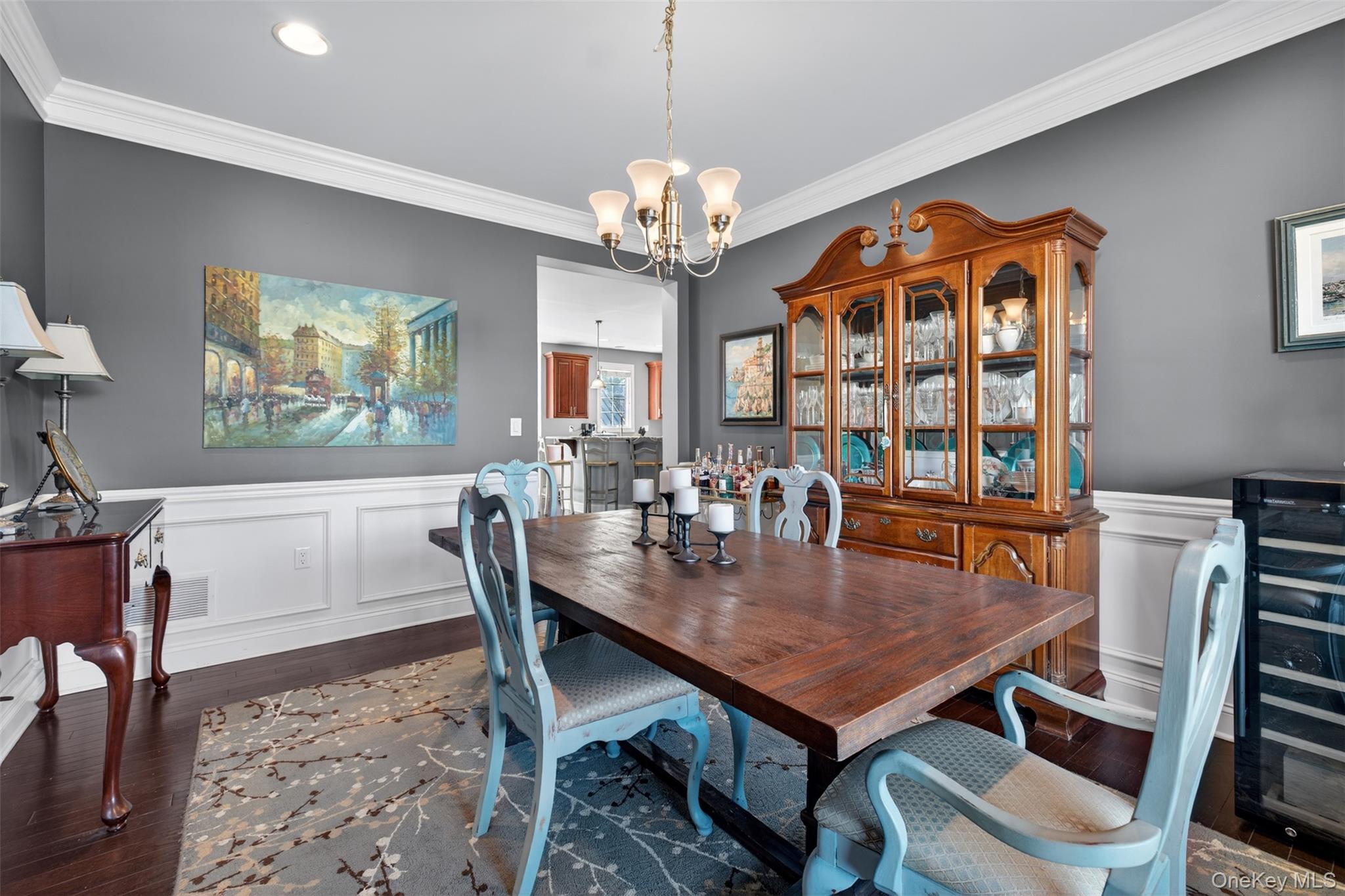 102 Luthien Forrest Road Rock Tavern, NY 12575 - Photo 14 of 45 a view of a dining room with furniture a chandelier and wooden floor