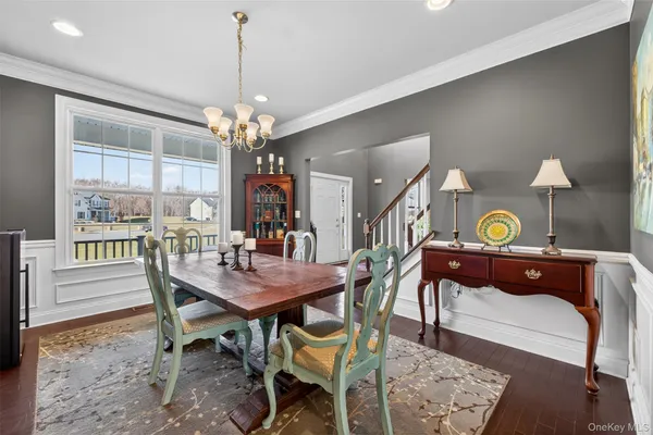 a view of a workspace with furniture