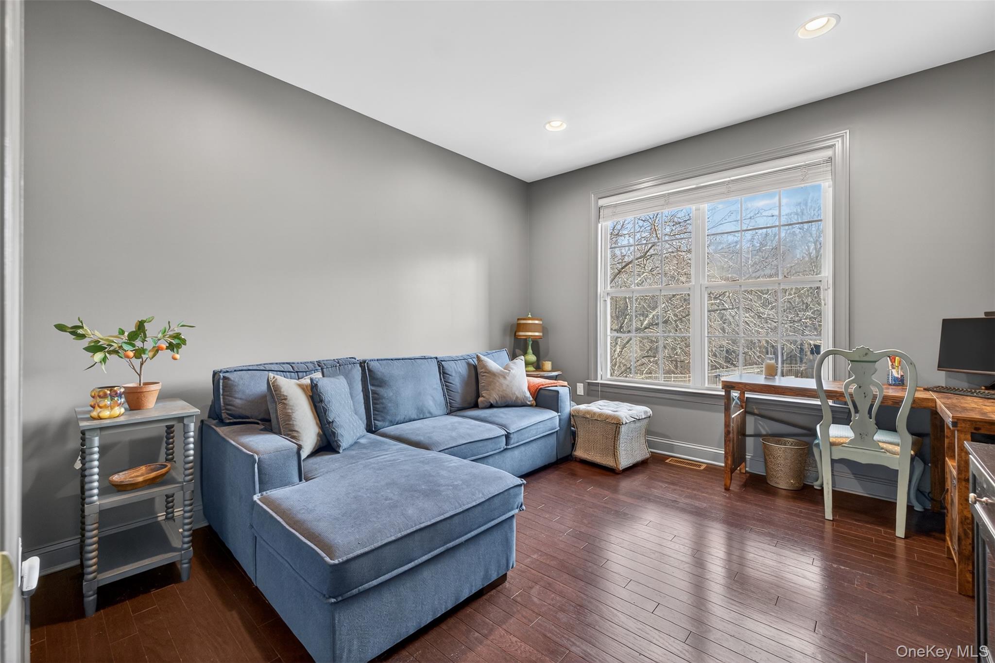 102 Luthien Forrest Road Rock Tavern, NY 12575 - Photo 18 of 45 a living room with furniture and a large window