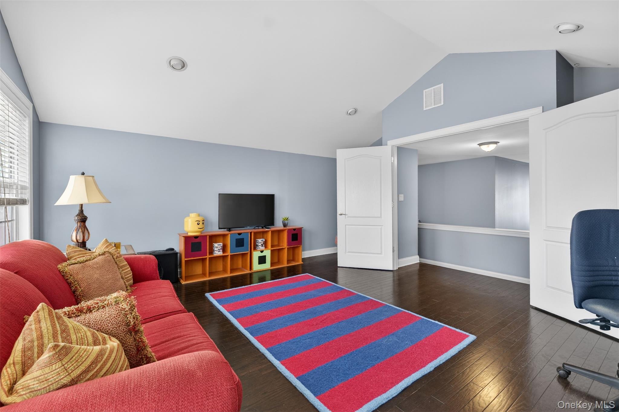 102 Luthien Forrest Road Rock Tavern, NY 12575 - Photo 34 of 45 a living room with furniture and a flat screen tv