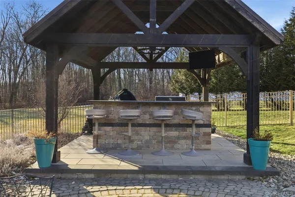 a view of balcony with outdoor seating and wooden floor