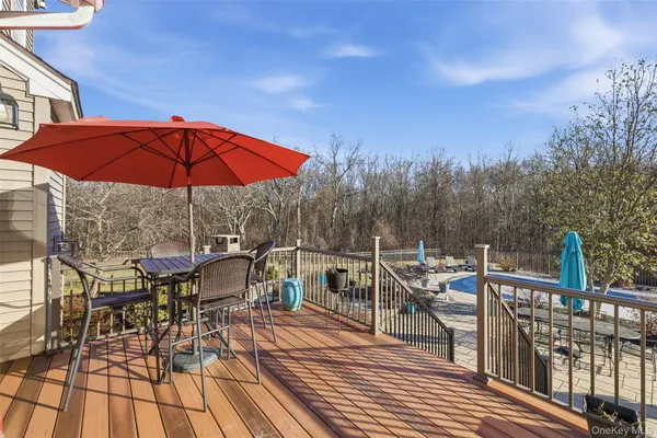 a view of a swimming pool with a lounge chairs