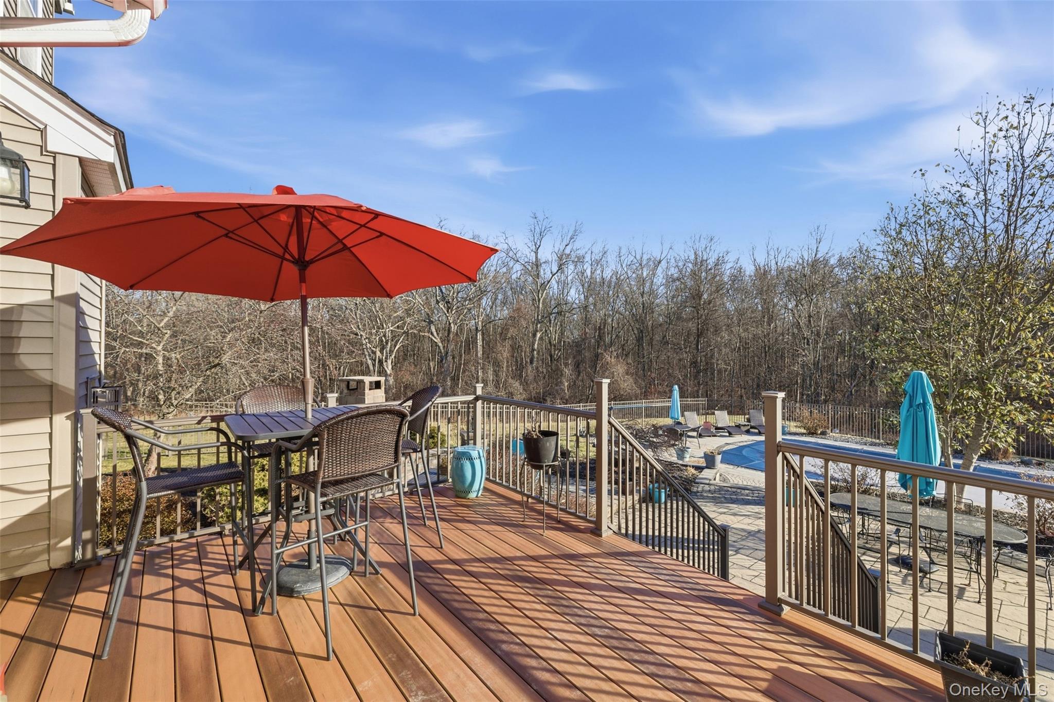 102 Luthien Forrest Road Rock Tavern, NY 12575 - Photo 44 of 45 a view of balcony with outdoor seating and wooden floor