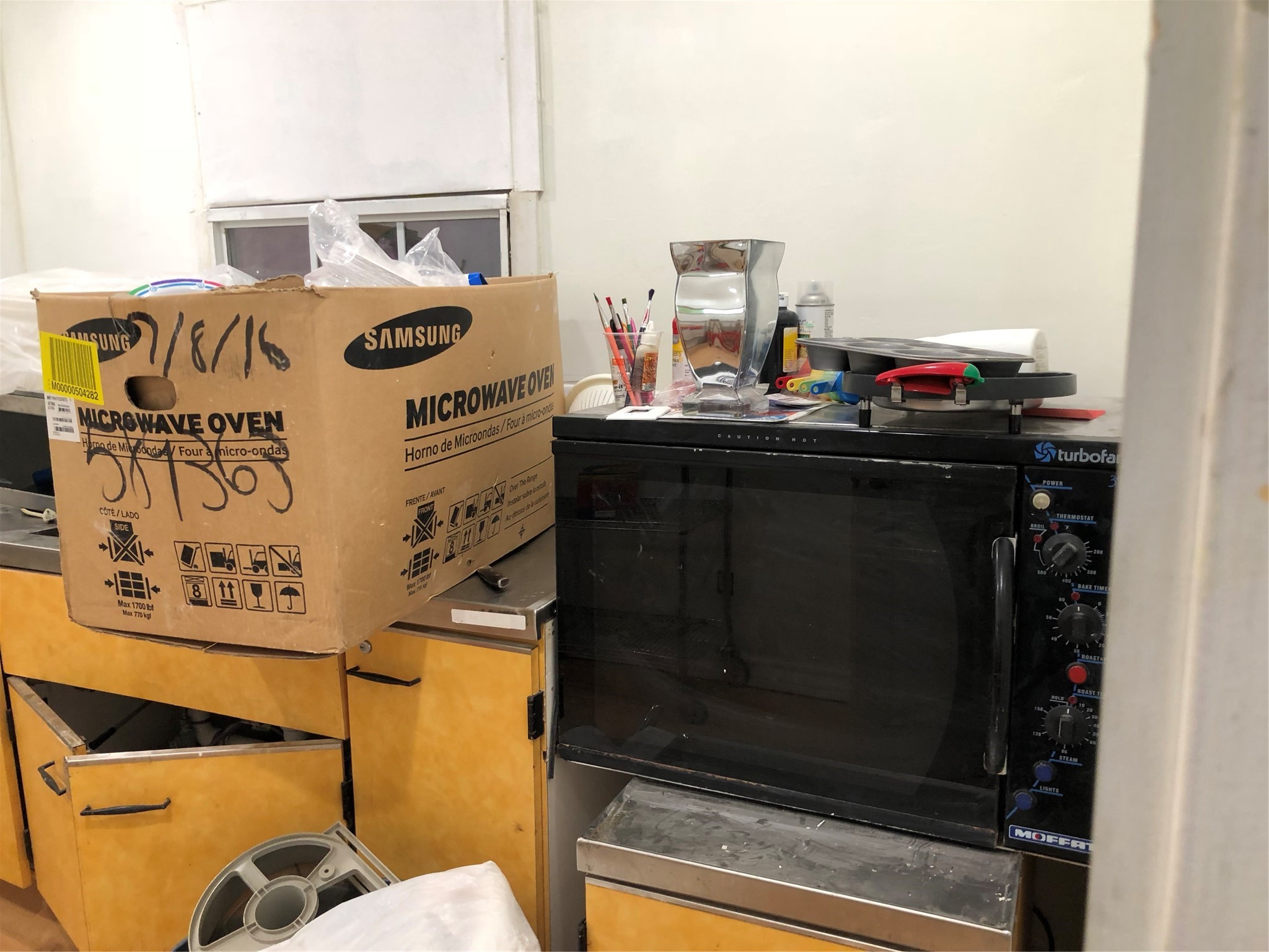 9317 Homestead Road Houston, TX 77016 - Photo 3 of 8 a bathroom with a sink and a mirror