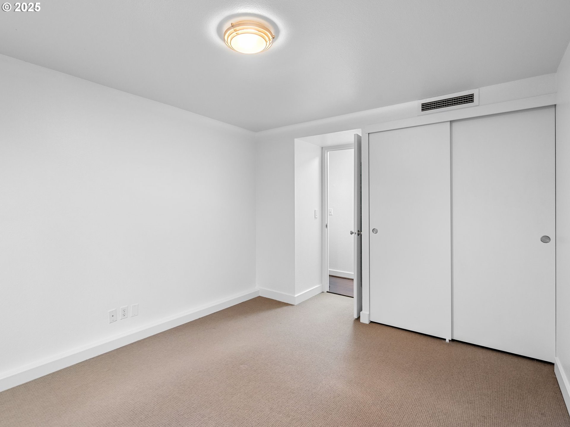 255 Southwest Harrison Street, Unit 3C Portland, OR 97201 - Photo 16 of 32 a view of an empty room