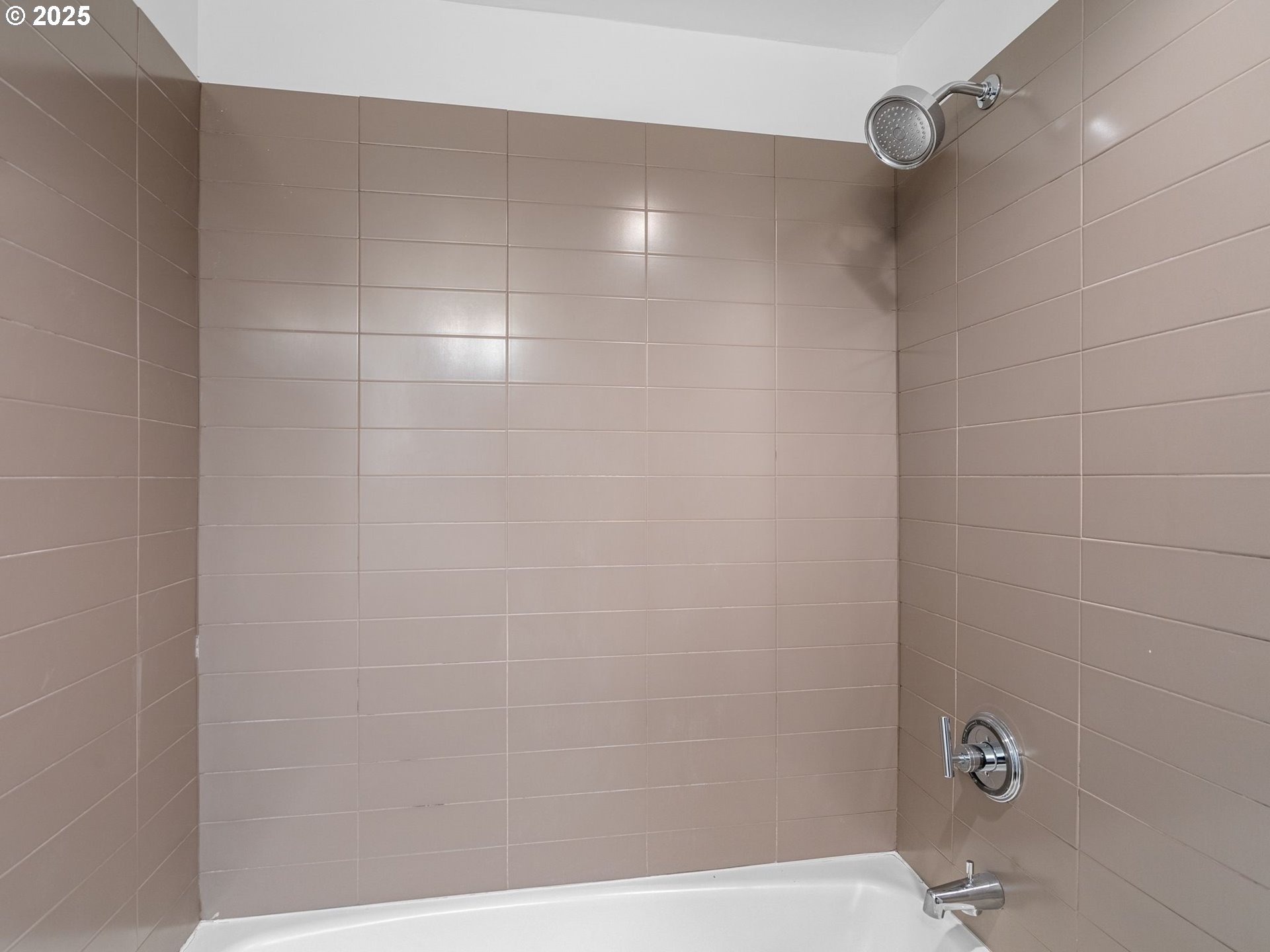 255 Southwest Harrison Street, Unit 3C Portland, OR 97201 - Photo 18 of 32 a bathroom with a shower